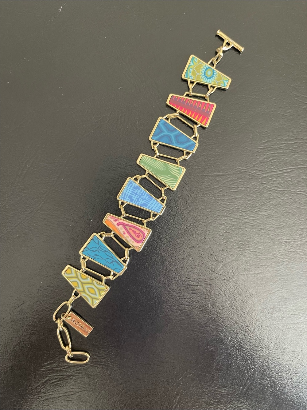 Jilzarah gold tone double sided reversible bracelet.